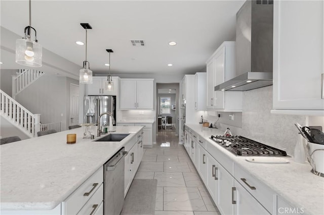 29945 Urtica Ct, Menifee, CA 92584 - kitchen with wall chimney range hood, a sink, marble finish floor, stainless steel appliances, and visible vents