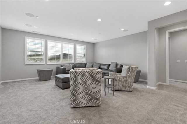 29945 Urtica Ct, Menifee, CA 92584 - living room featuring baseboards, carpet floors, and recessed lighting