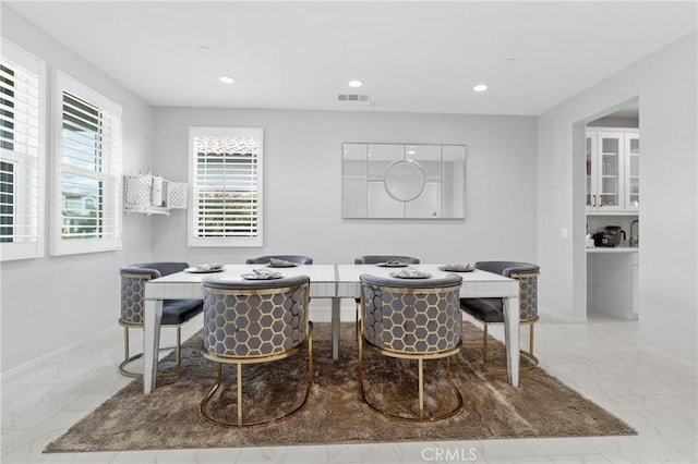 29945 Urtica Ct, Menifee, CA 92584 - dining area featuring recessed lighting, visible vents, marble finish floor, and baseboards