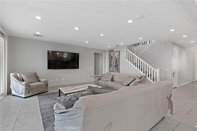 living room with baseboards, visible vents, marble finish floor, stairs, and recessed lighting