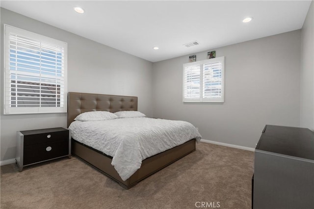 bedroom with carpet, visible vents, baseboards, and recessed lighting