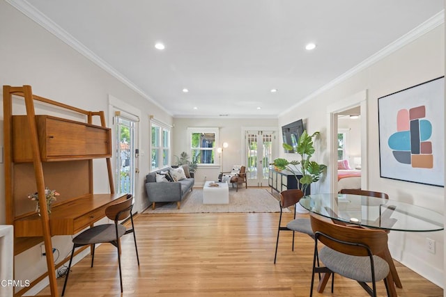 living room with crown molding, light wood-style flooring, recessed lighting, and french doors