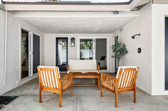 view of patio with visible vents and an outdoor hangout area