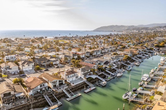 aerial view featuring a residential view and a water view