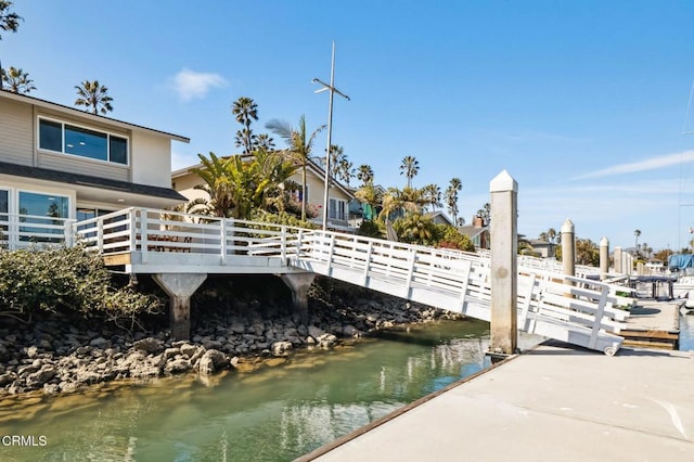 dock area with a water view