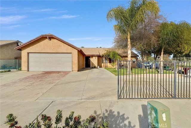 ranch-style home with a garage, concrete driveway, fence, and stucco siding