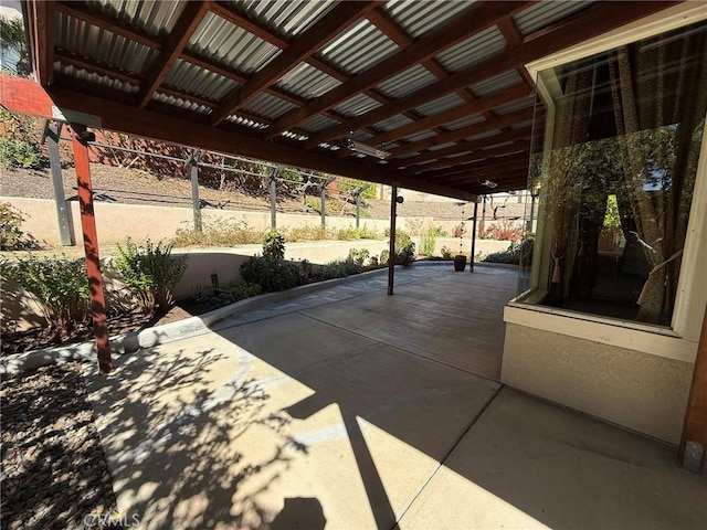 view of patio with fence