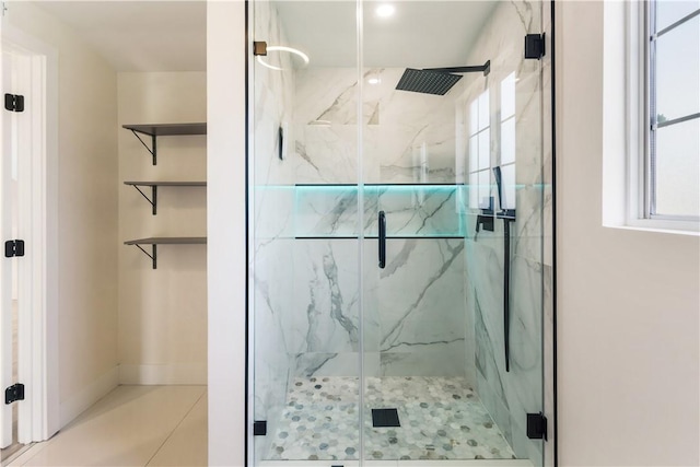 full bath with a marble finish shower