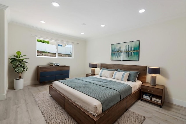 bedroom with recessed lighting, light wood-type flooring, baseboards, and ornamental molding