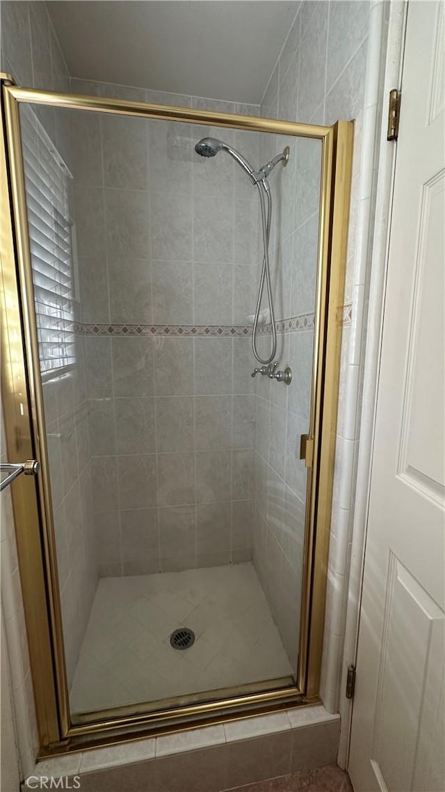 bathroom with a stall shower