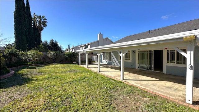 view of yard with a patio area and fence