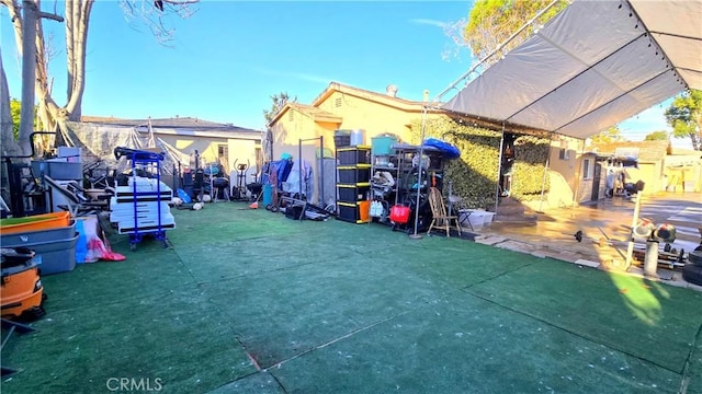 view of home's community featuring a patio