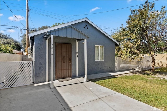 view of outdoor structure with fence