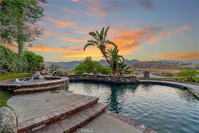 view of pool featuring a mountain view