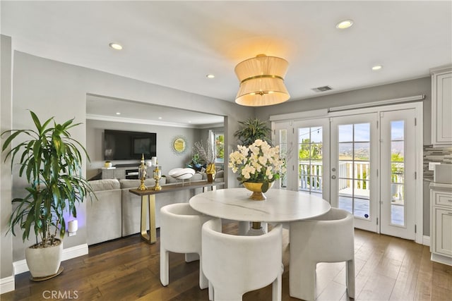 dining area with recessed lighting, visible vents, dark wood-type flooring, and french doors