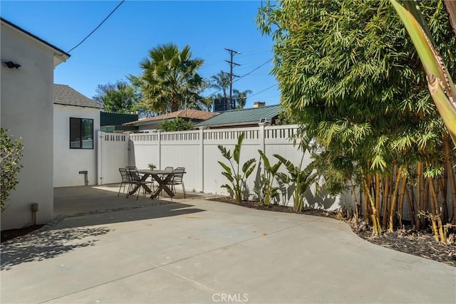 view of patio with fence