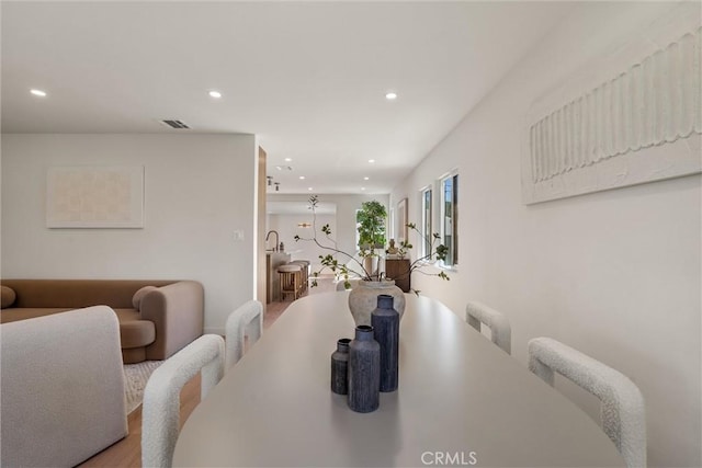 dining area with visible vents and recessed lighting