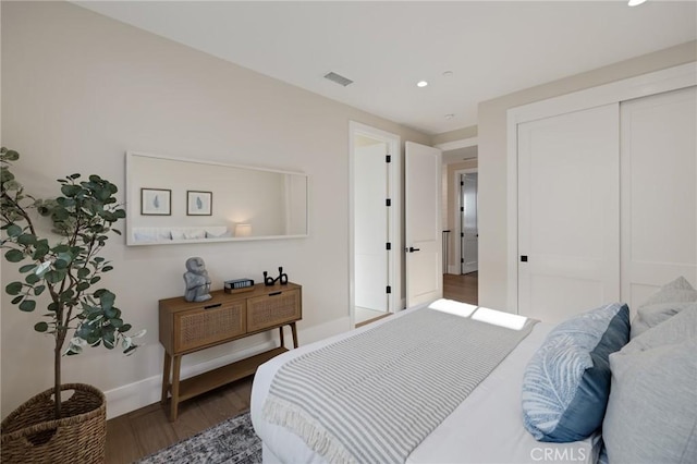 1820 9th St, Manhattan Beach, CA 90266 - bedroom with a closet, baseboards, recessed lighting, visible vents, and wood finished floors