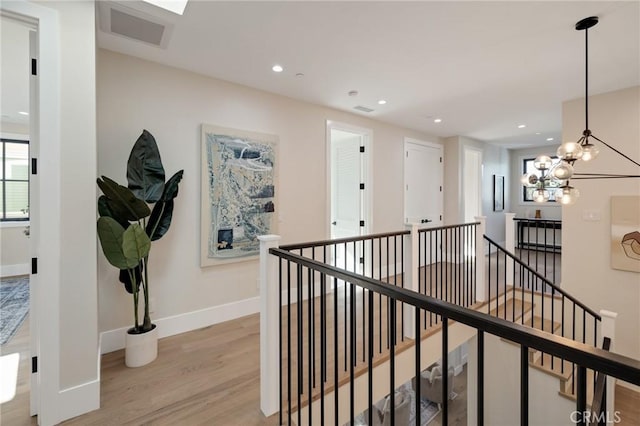 1820 9th St, Manhattan Beach, CA 90266 - corridor with recessed lighting, baseboards, an upstairs landing, and light wood-style floors