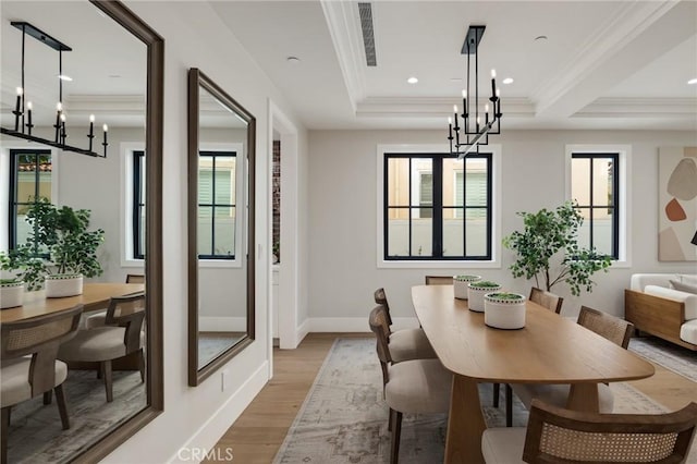 1820 9th St, Manhattan Beach, CA 90266 - dining area featuring crown molding, a chandelier, and light wood-style floors