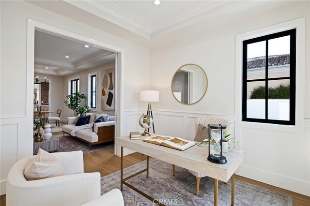 1820 9th St, Manhattan Beach, CA 90266 - office area featuring a decorative wall, a tray ceiling, ornamental molding, and wood finished floors