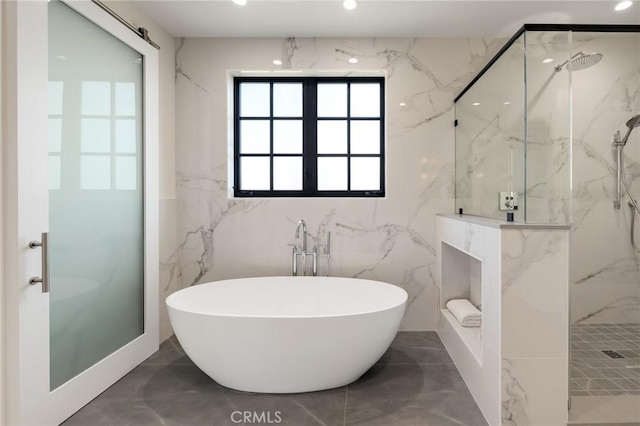 1820 9th St, Manhattan Beach, CA 90266 - full bath featuring a soaking tub, recessed lighting, marble finish floor, tile walls, and a marble finish shower