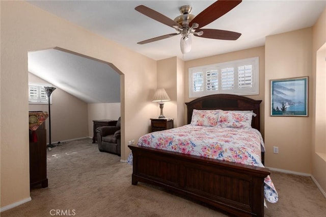 bedroom with a ceiling fan, carpet, and baseboards