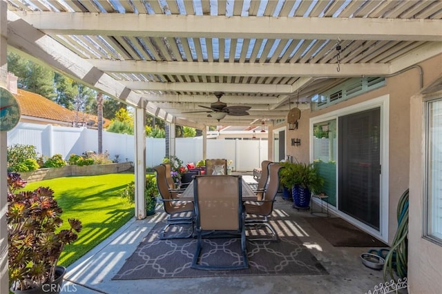 view of patio / terrace with ceiling fan, outdoor dining area, a fenced backyard, and a pergola