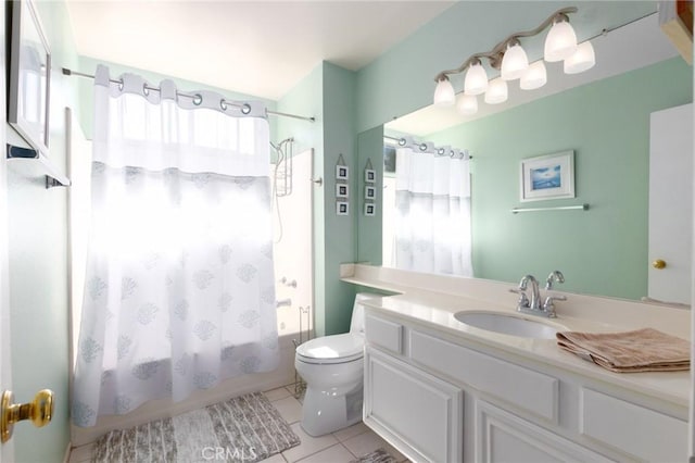 full bathroom featuring shower / tub combo, vanity, toilet, and tile patterned floors