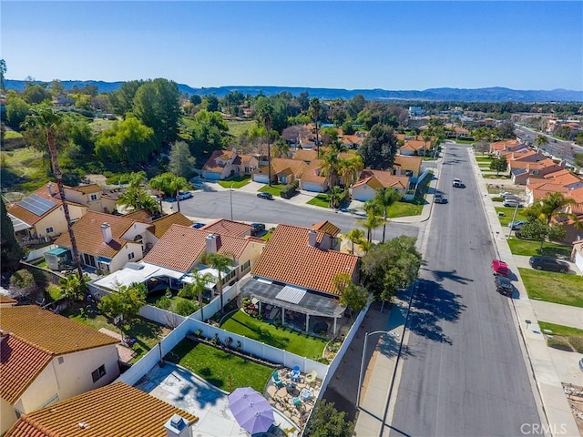 aerial view with a mountain view and a residential view