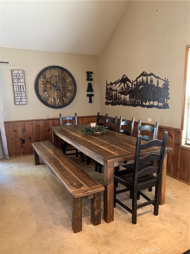 33492 Wild Rose Dr, Green Valley Lake, CA 92341 - dining room featuring light carpet, wooden walls, and wainscoting