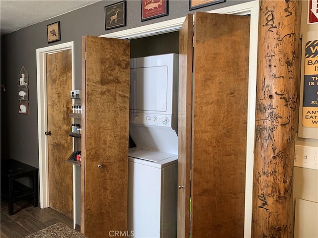 33492 Wild Rose Dr, Green Valley Lake, CA 92341 - washroom with stacked washer and dryer and laundry area