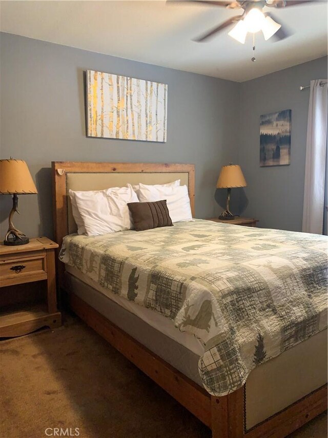 33492 Wild Rose Dr, Green Valley Lake, CA 92341 - carpeted bedroom featuring a ceiling fan