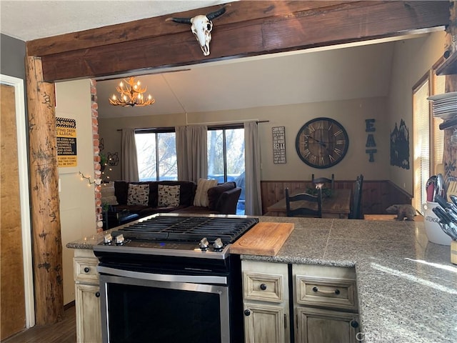 33492 Wild Rose Dr, Green Valley Lake, CA 92341 - kitchen featuring vaulted ceiling with beams, dark wood-type flooring, gas stove, and a notable chandelier