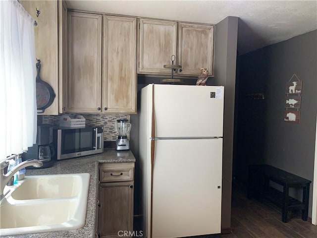 33492 Wild Rose Dr, Green Valley Lake, CA 92341 - kitchen with light brown cabinets, a sink, backsplash, freestanding refrigerator, and stainless steel microwave