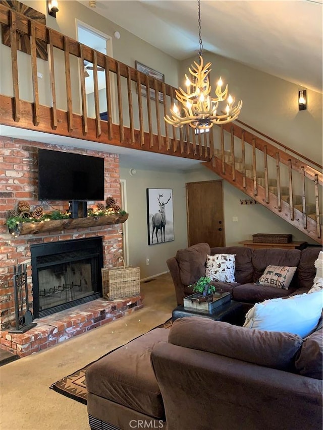 33492 Wild Rose Dr, Green Valley Lake, CA 92341 - carpeted living area featuring a chandelier, a high ceiling, stairway, and a fireplace