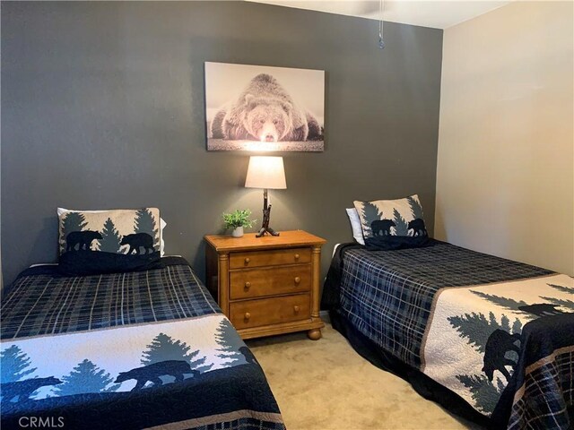 33492 Wild Rose Dr, Green Valley Lake, CA 92341 - bedroom featuring light colored carpet