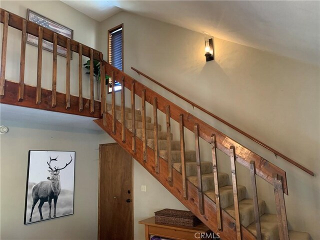 33492 Wild Rose Dr, Green Valley Lake, CA 92341 - staircase with lofted ceiling