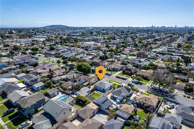 birds eye view of property with a residential view