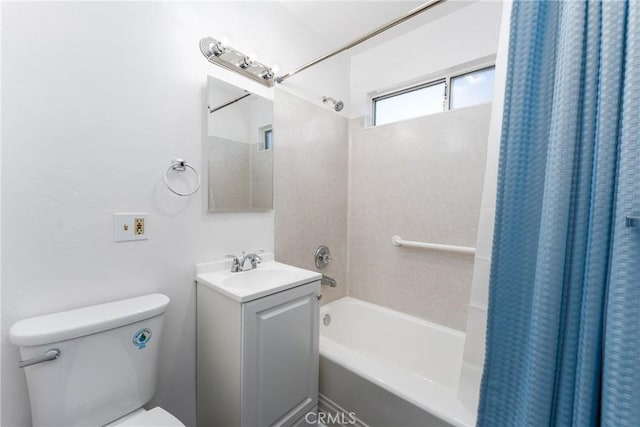 bathroom with toilet, shower / tub combo, and vanity