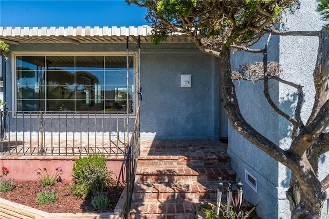 view of home's exterior with stucco siding