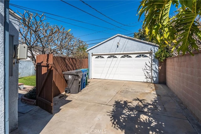 detached garage with fence