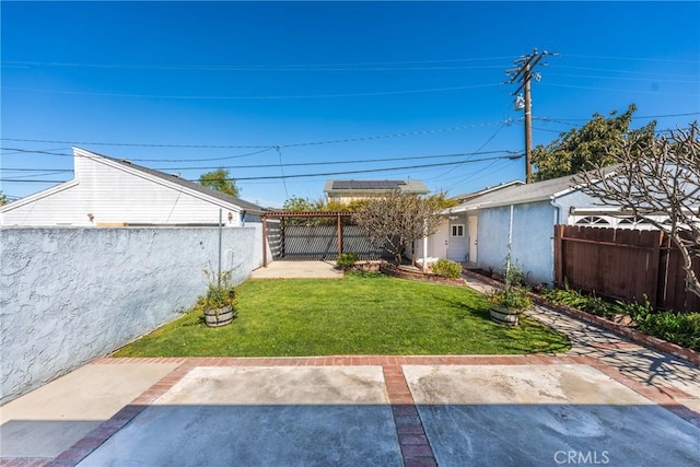 view of yard featuring a patio and a fenced backyard