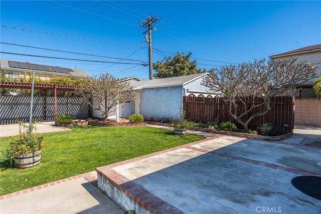 view of yard featuring a fenced backyard and a patio