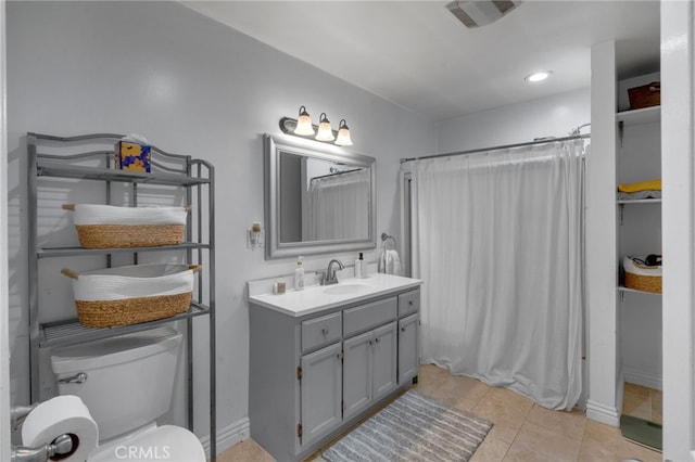 full bathroom with visible vents, toilet, curtained shower, tile patterned flooring, and vanity