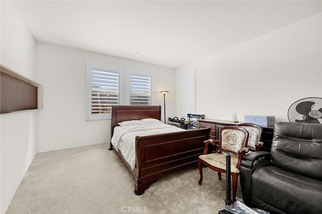 bedroom with light carpet