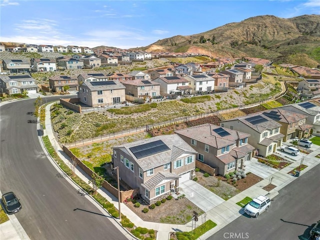 bird's eye view featuring a mountain view and a residential view