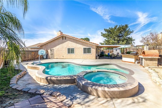 view of swimming pool featuring a pool with connected hot tub, a fenced backyard, a patio, and area for grilling