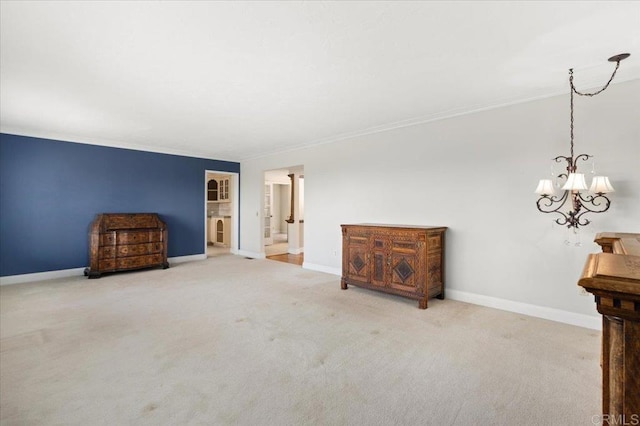 interior space with carpet, baseboards, and crown molding