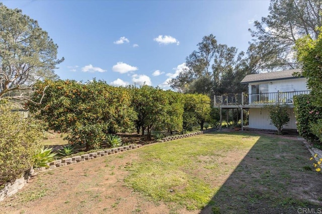 view of yard featuring a deck